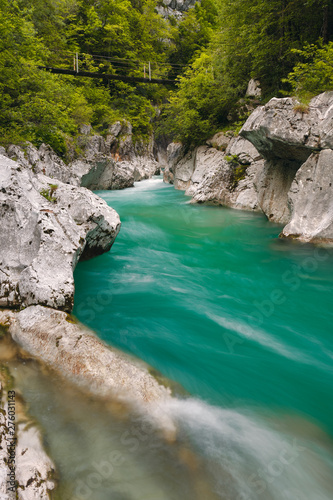 gorge of Koritnica river in Slovenia with a bridge in the backround