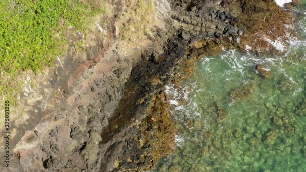 Aerial: Waves Crash Against Mokoli'i, Oahu, Hawaii Aerial: Waves Crash Against Mokoli'i, Oahu, Hawaii