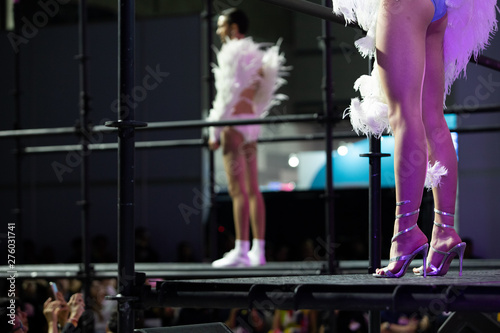 Fotografie Many Legs and Shoes Female Models walk in Fashion Show of Spring Summer Lingerie