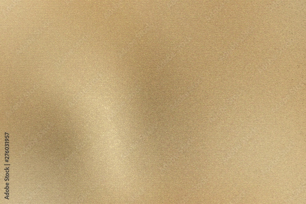 Glowing light brown brushed metal wall, abstract texture background Glowing light brown brushed metal wall, abstract texture background