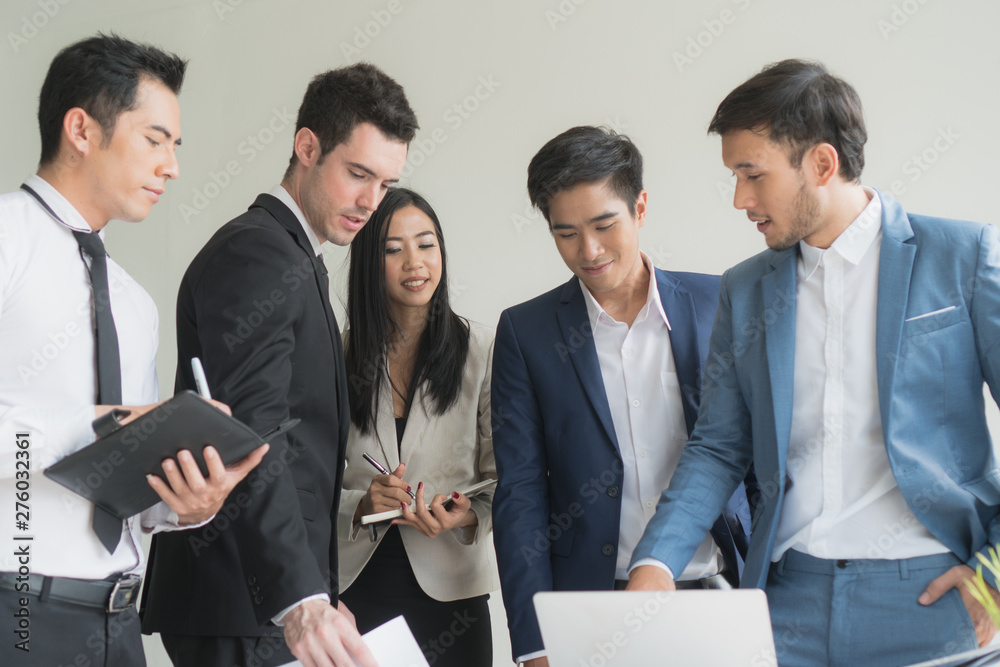 Business team casual meeting and discussing in workplace.