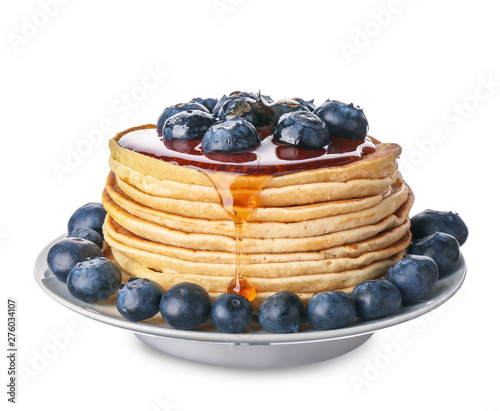 Tasty pancakes with blueberry on white background