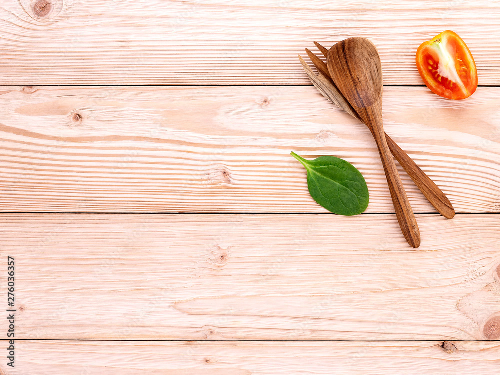 Food background and salad concept with raw ingredients flat lay on white wooden background. Food background and salad concept with raw ingredients flat lay on white wooden background.