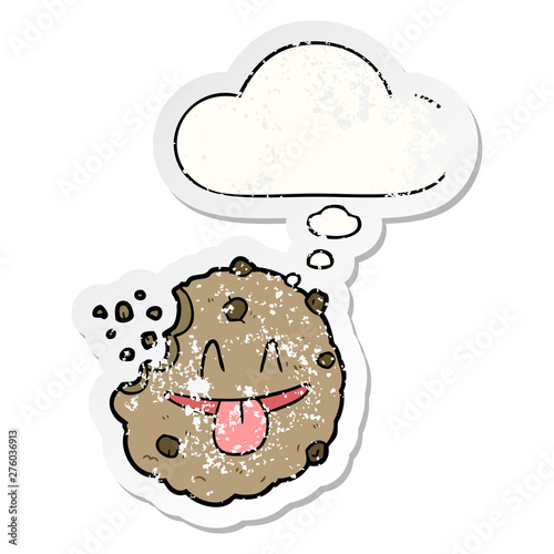 cartoon cookie and thought bubble as a distressed worn sticker