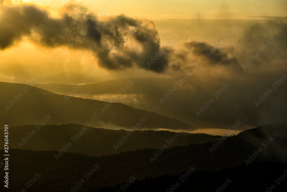 A beautiful sunrise in the mountains. A delightful summer landscape. Polonina Carynska. Bieszczady National Park. Poland. A beautiful sunrise in the mountains. A delightful summer landscape. Polonina Carynska. Bieszczady National Park. Poland.