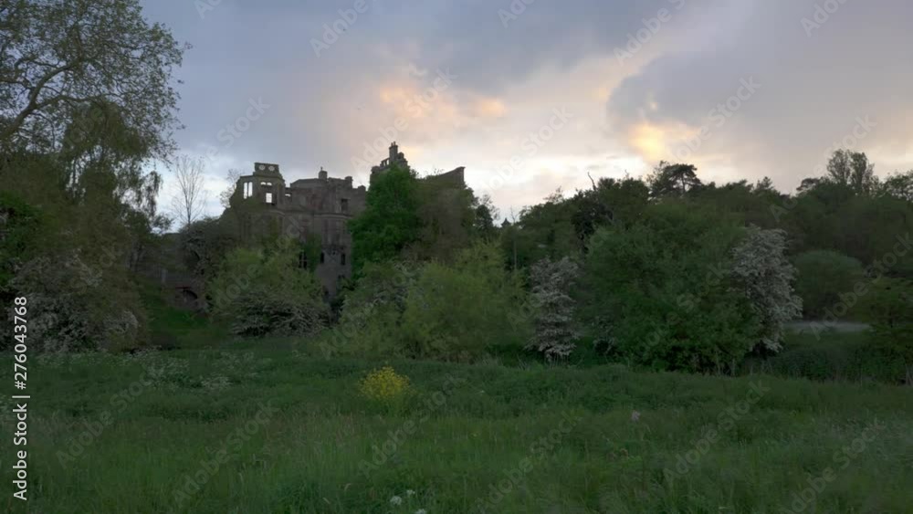 Slow panning shot of a spooky ruined mansion in Old Milverton near Leamington Spa, Warickshire, England, UK Slow panning shot of a spooky ruined mansion in Old Milverton near Leamington Spa, Warickshire, England, UK