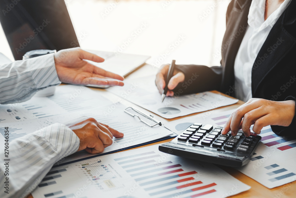 Naklejka premium Business team meeting Strategy Planning with new startup project plan Finance and Economy Graph with laptop successful teamwork