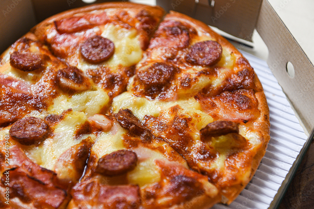 pizza in box close up / delicious tasty fast food italian traditional pizza cheese pizza in box close up / delicious tasty fast food italian traditional pizza cheese