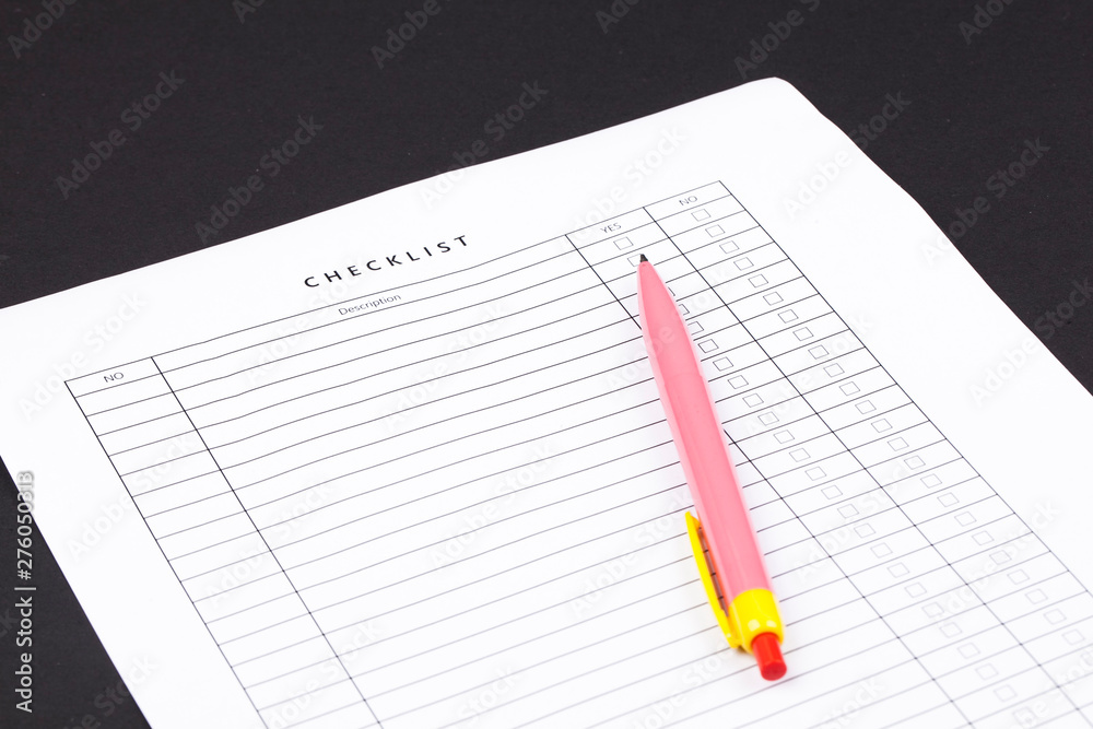 Checklist box with red checkmark, paper and a pen with checklist . Checklist box with red checkmark, paper and a pen with checklist .