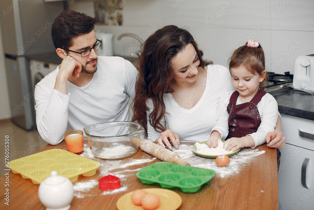 Family in a kitchen. Beautiful mother with little son Family in a kitchen. Beautiful mother with little son