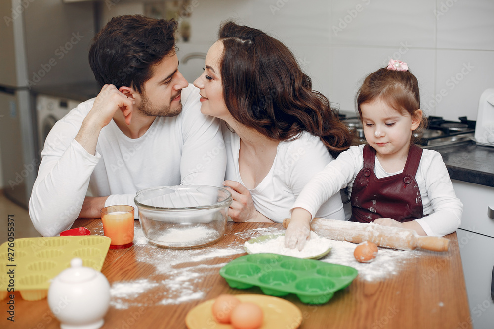 Family in a kitchen. Beautiful mother with little son Family in a kitchen. Beautiful mother with little son