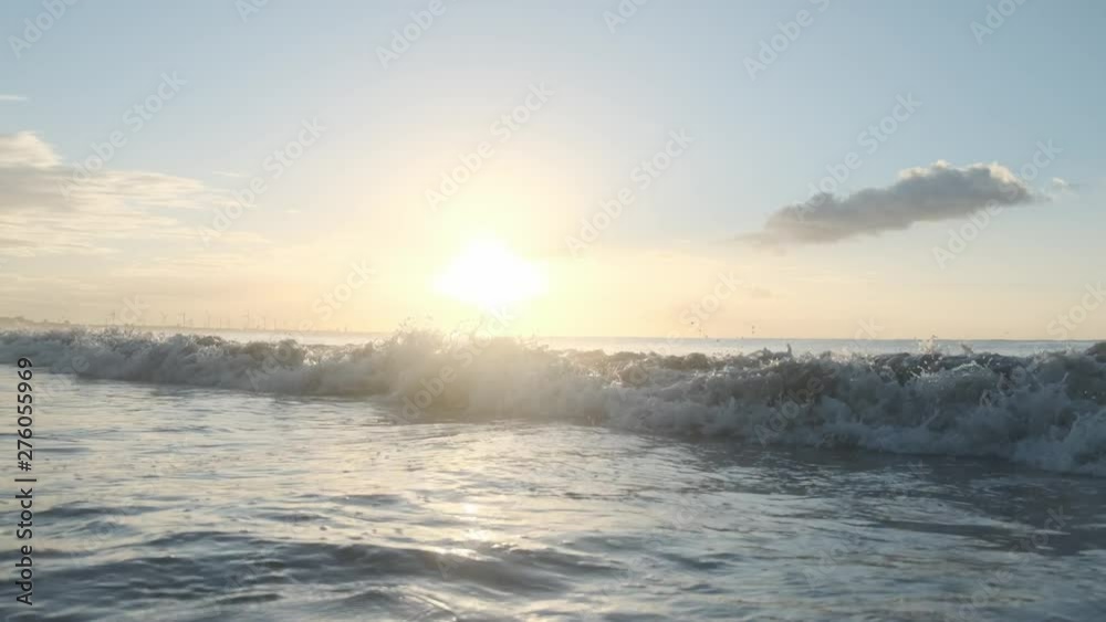 Summer ocean waves. Waves rolling. Blue wave on the sandy beach. Brazilian beach.