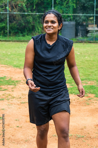 beautiful sporty indian athlete woman playing football © Mira