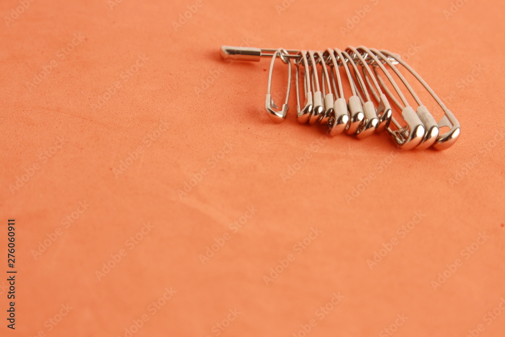 sewing pin on colorful background sewing pin on colorful background
