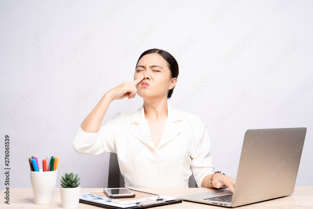 Woman wipe her nose at office isolated white background Woman wipe her nose at office isolated white background