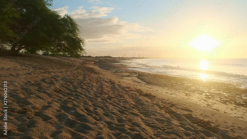 Summer ocean waves. Waves rolling. Blue wave on the sandy beach. Brazilian beach. Summer ocean waves. Waves rolling. Blue wave on the sandy beach. Brazilian beach.