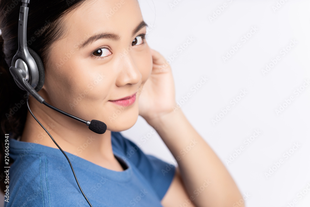 Close up shot of woman operator in headset isolated white background Close up shot of woman operator in headset isolated white background