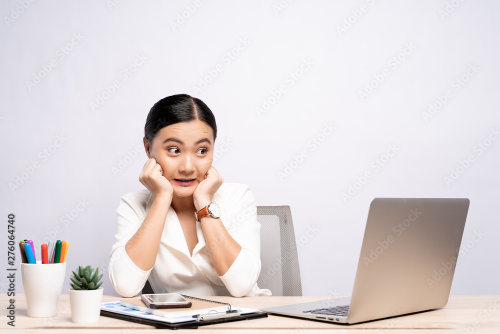 Portrait of a woman feel scared sitting at office isolated over background Portrait of a woman feel scared sitting at office isolated over background