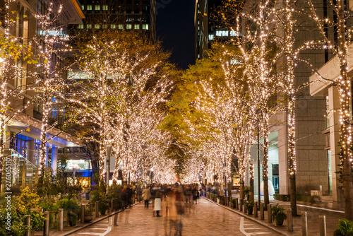                                                                A night view of  Marunouchi Nakadori Avenue  with shining golden illuminations. Chiyoda  Tokyo  Japan.