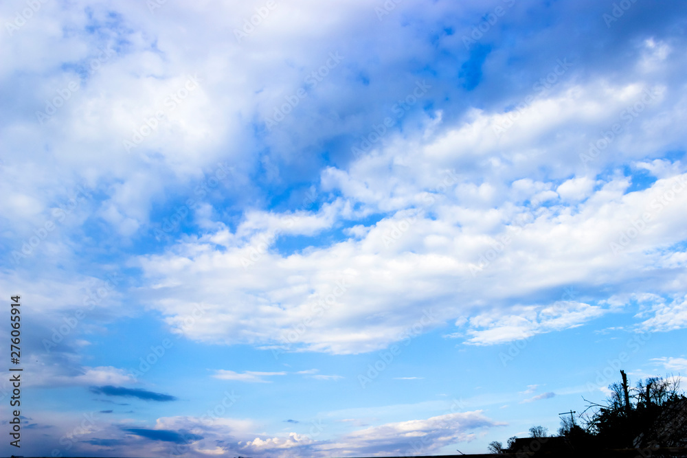 Clouds and blue sky background with copy space