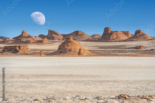 Dasht-e-Lut, Lut desert,hottest desert in the world, also known like Kalut Desert with full moon above horizon