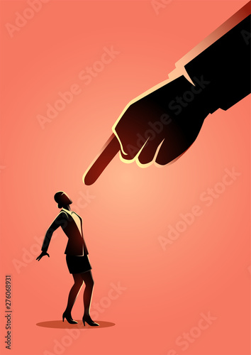Businesswoman being pointed by giant finger