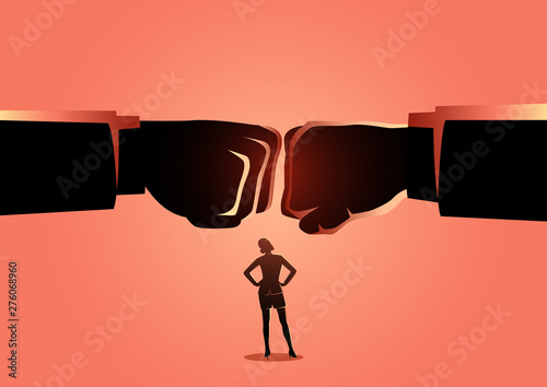 Businesswoman watching two giant fist clashed