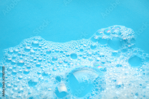 Background soap suds (foam) and bubbles from detergent. House cleaning concept.