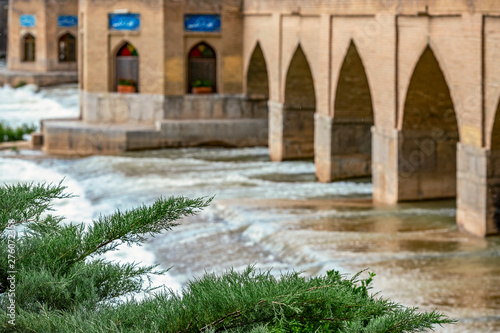 ittle and cozy Chobi Bridge over river Zayanderud in city Isfahan photo