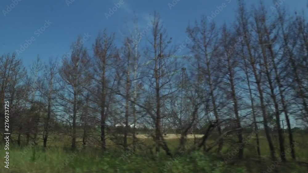 Chernobyl nuclear reactor containment enclosure seen from vehicle Chernobyl nuclear reactor containment enclosure seen from vehicle