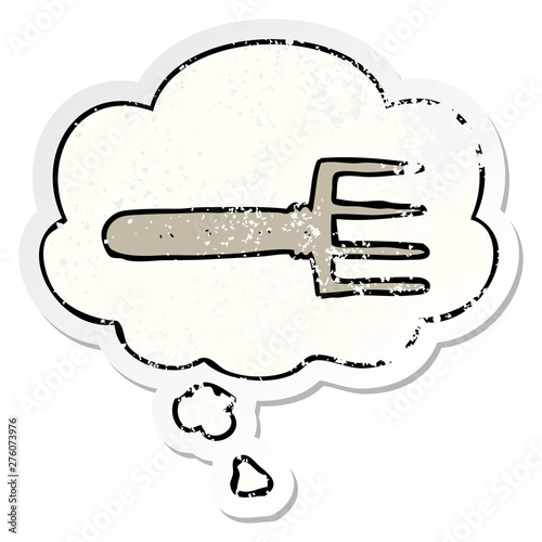 cartoon fork and thought bubble as a distressed worn sticker