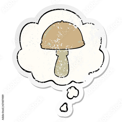 cartoon mushroom and thought bubble as a distressed worn sticker