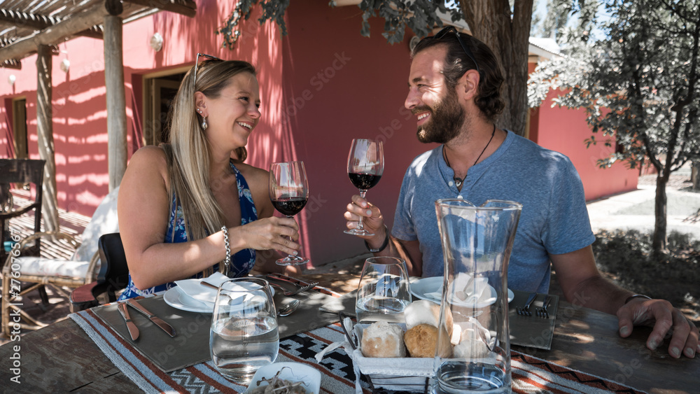 Couple drinking wine at wine tasting in Mendoza