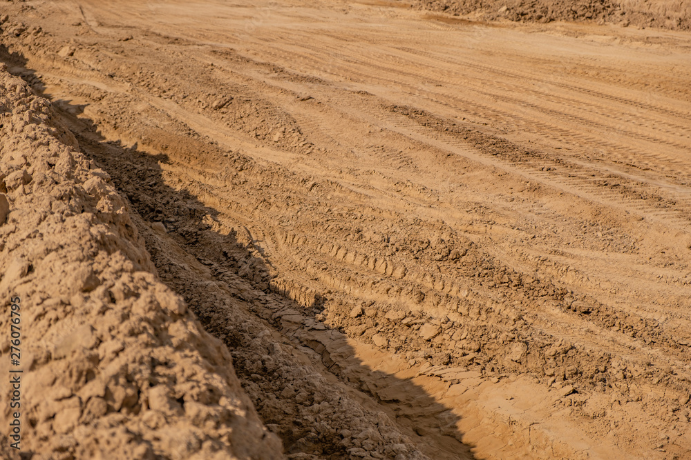 dry ground destroyed by heavy machinery