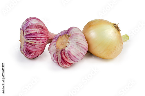 Young heads of purple garlic and onion on white background
