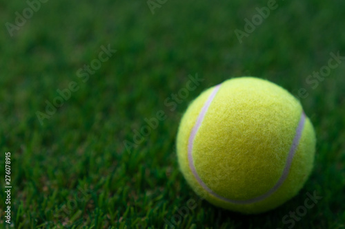 Tennis ball on a green background,Tennis © poylock19