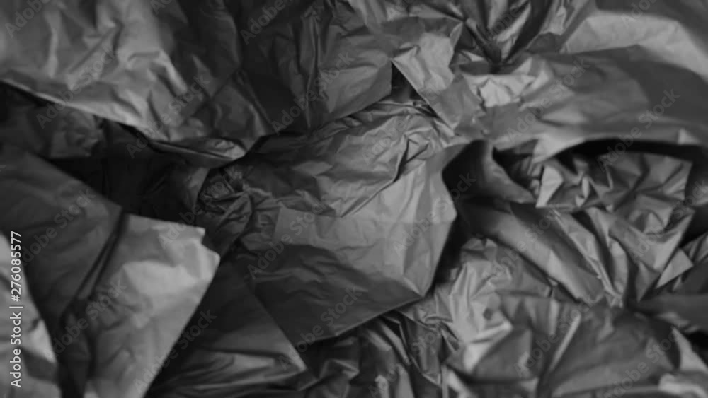 Luxurious, abstract, grungy background made of elegant black wrapping paper. Luxurious, abstract, grungy background made of elegant black wrapping paper.