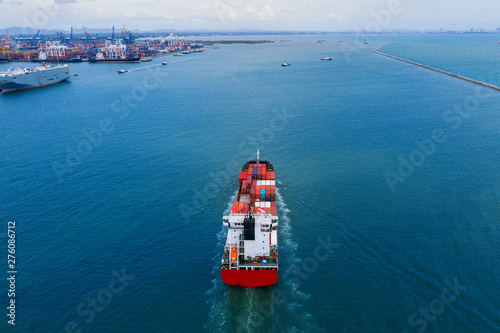 Aerial view of container cargo ship in sea.