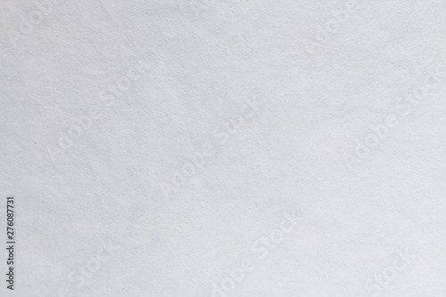 White paper texture for use as a background. High quality photography.