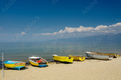 Pogradec, Albania. Colorful boats by the lake Ohrid