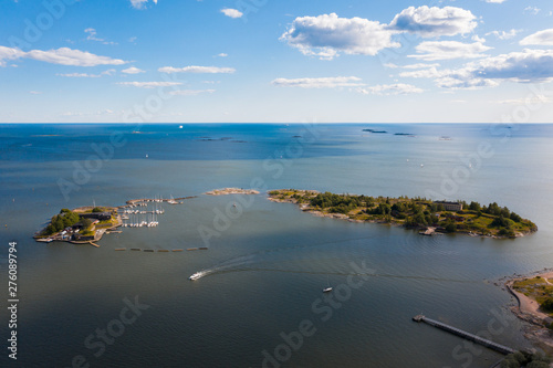 Helsinki. Finland. View of the island of Taiteilijatalo Harakka ry from the height of bird flight. In the frame of the island, yachts, ships photo