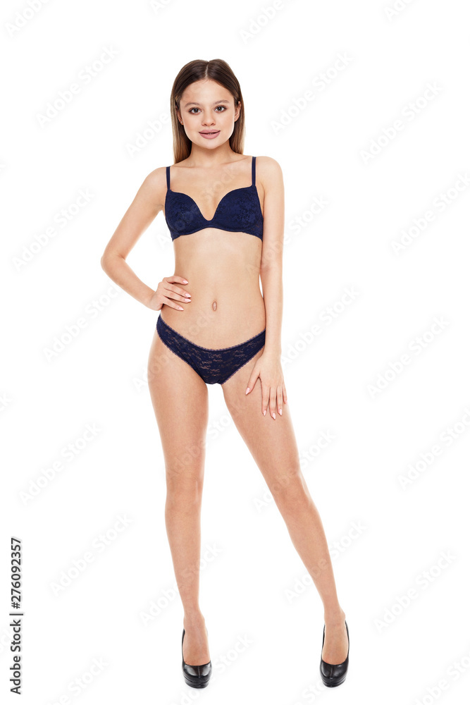 Young girl in blue lingerie isolated on white background Stock Photo