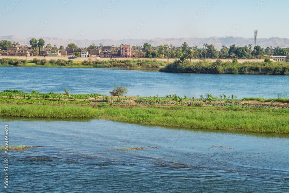 Armant Island with some habitation in the background, near Luxor