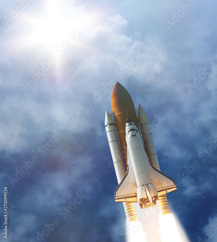 Spaceship Leaving Earth. Space craft taking off into deep space. Elements of this image furnished by NASA.