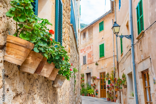 Fototapeta Naklejka Na Ścianę i Meble -  Street of Valldemossa old mediterranean village, landmark of Majorca, Spain island