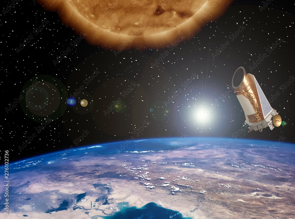 Big sun and space satellite. Earth from space. The elements of this image furnished by NASA. Big sun and space satellite. Earth from space. The elements of this image furnished by NASA.
