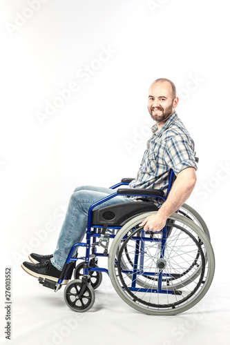 Caucasian man smiling and positive expression, disabled on wheelchair