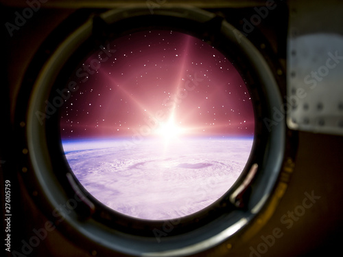 Fototapeta Naklejka Na Ścianę i Meble -  Sunrise, view from spaceship. Elements of this image furnished by NASA.