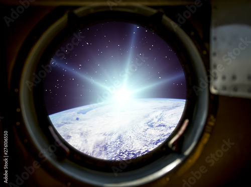 Fototapeta Naklejka Na Ścianę i Meble -  Sunrise, view from spaceship. Elements of this image furnished by NASA.