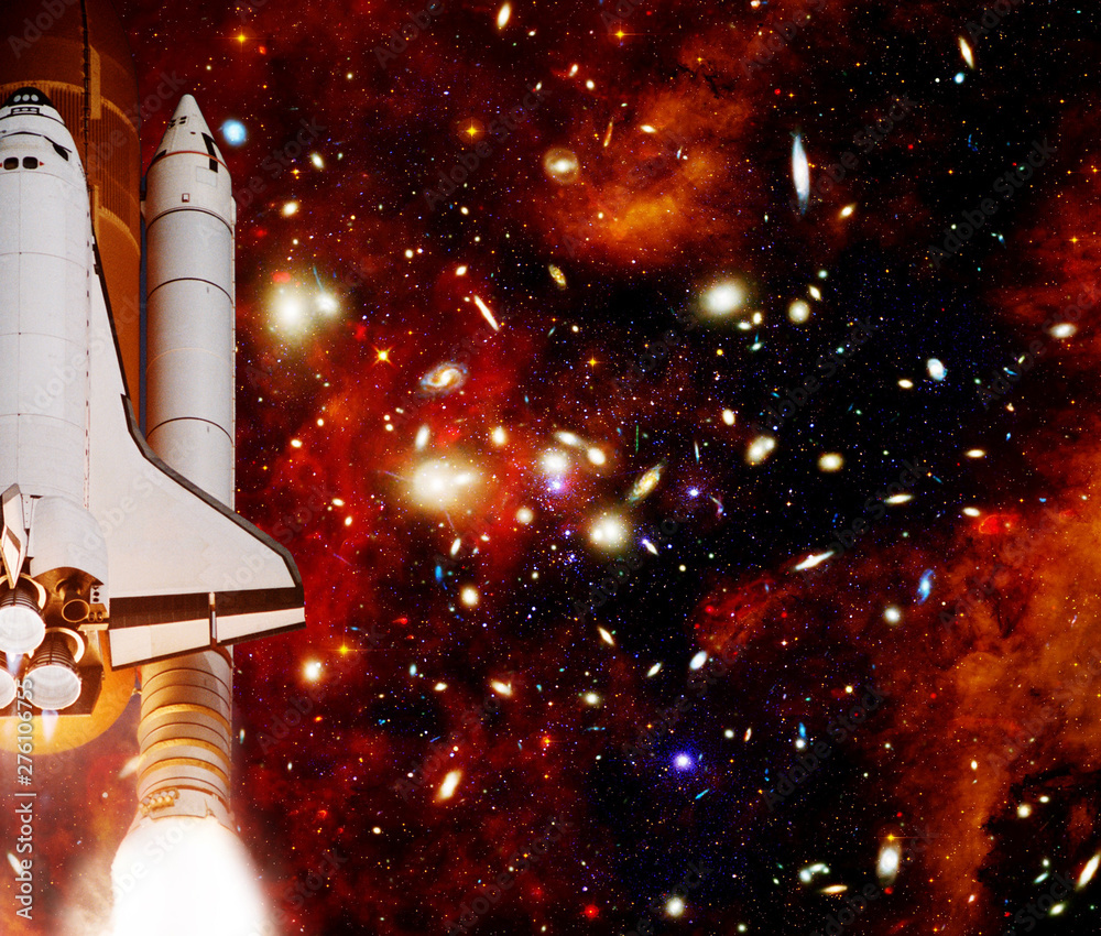 Rocket (shuttle) and galaxy. The elements of this image furnished by NASA. Rocket (shuttle) and galaxy. The elements of this image furnished by NASA.